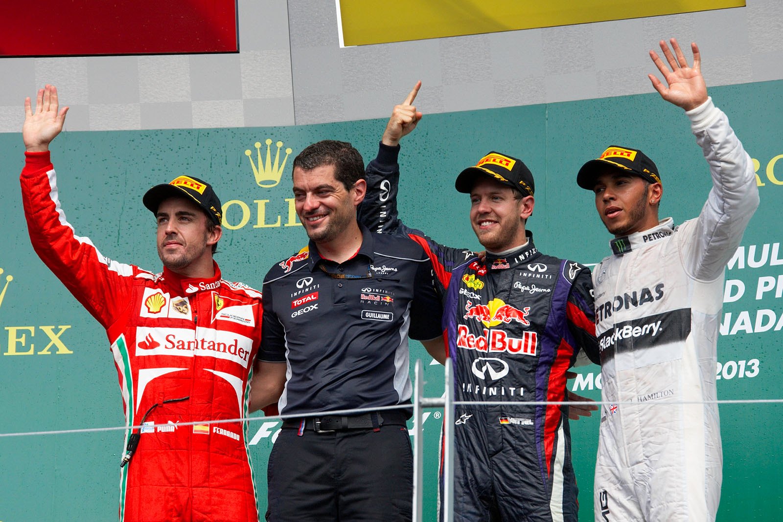 Final podium ceremony group photo of second placed Fernando Alonso of Ferrari, RBR race engineer Guillaume Rocquelin with race winner Sebastian Vettel, and third placed Mercedes race driver Lewis Hamilton