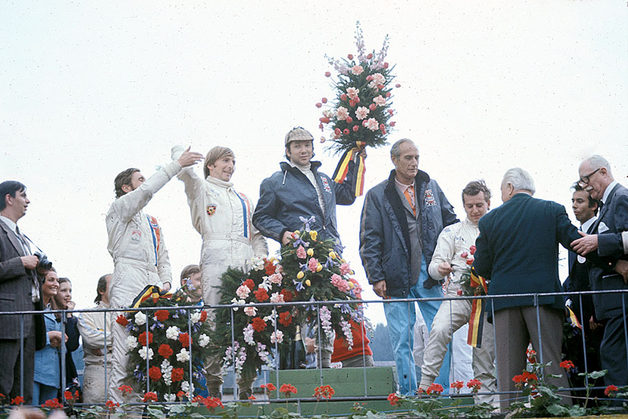 First placed Porsche teammates Pedro Rodriguez (MEX) and Jackie Oliver (GB) on the podium besides the second placed team Jo Siffert (CH) and Derek Bell (GB), both driving for John Wyer's J. W. Automotive