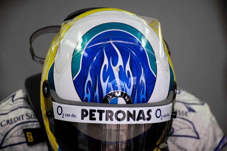 Nick Heidfeld showing his helmet design