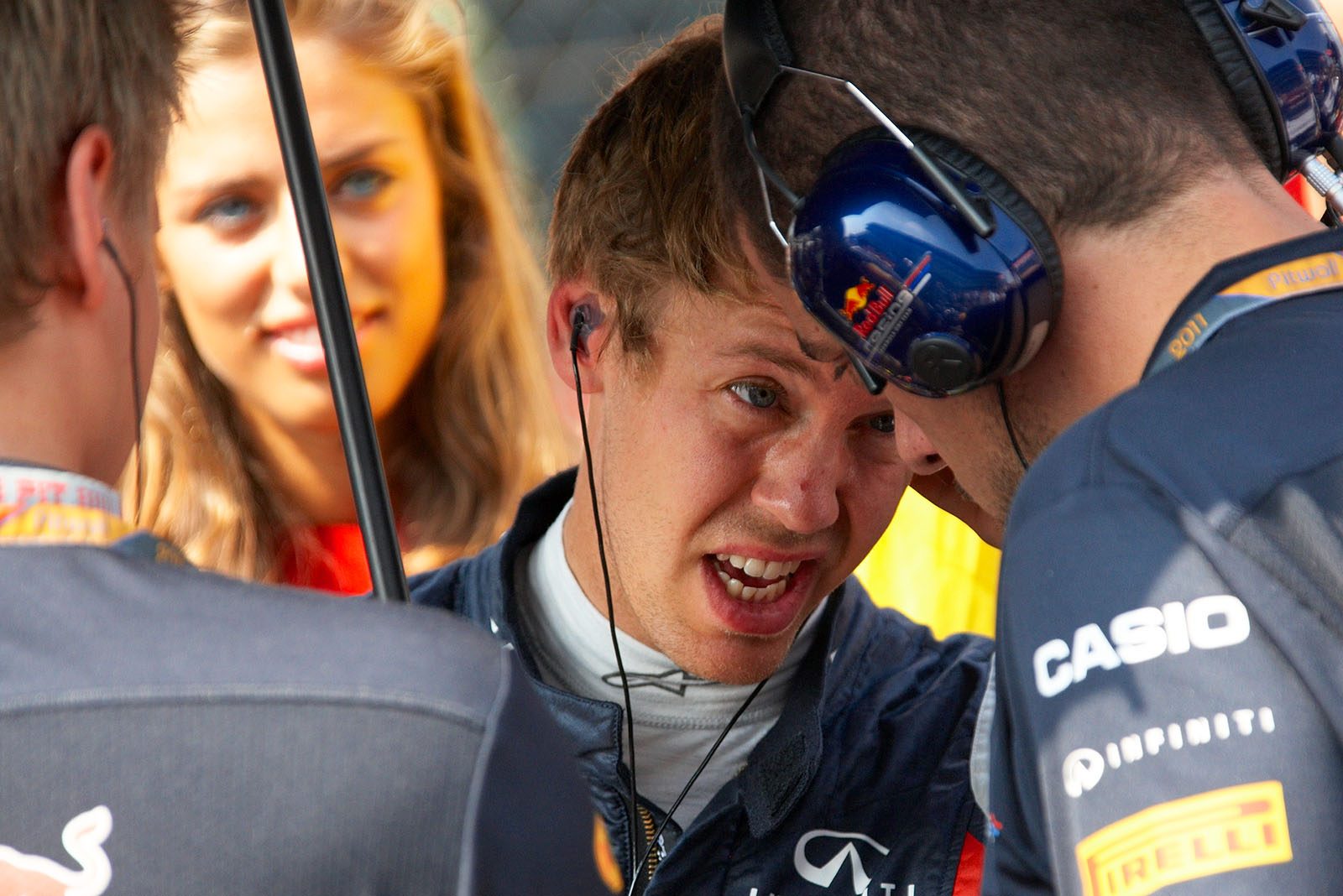 Sebastian Vettel speaks to Red Bull Racing engineer Rocquelin