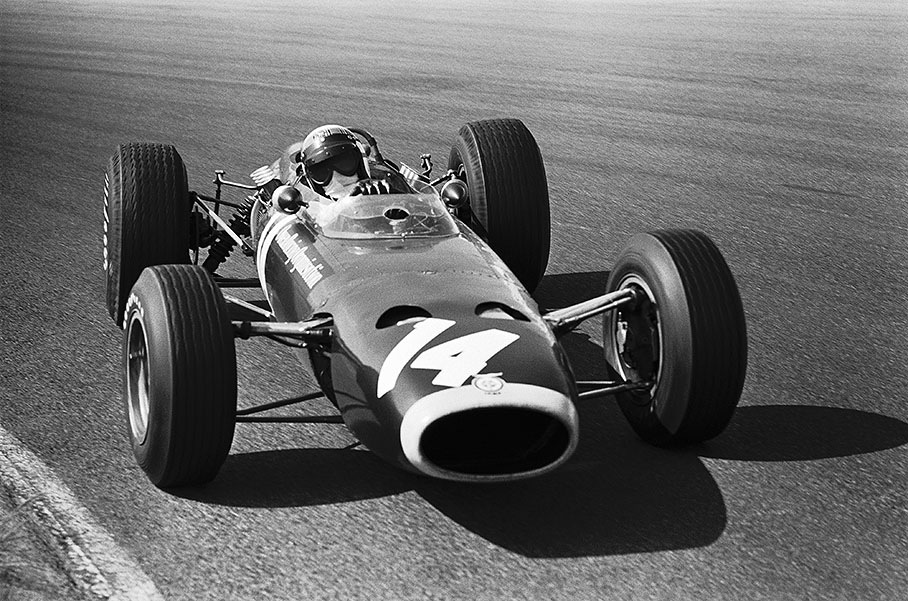 Jackie Stewart drifts in his BRM P261 through Tarzan corner
