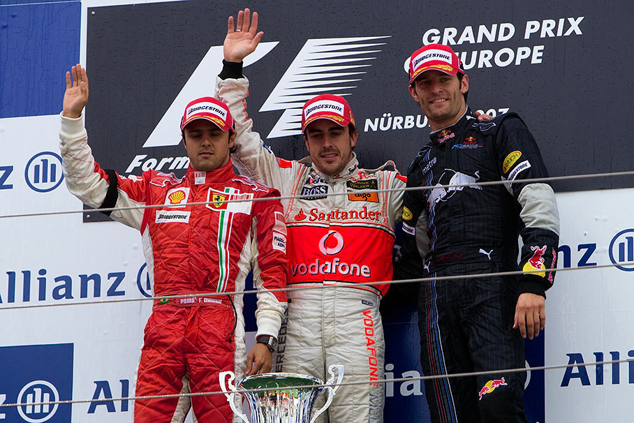 Podium group photo: second placed Massa, winner Alonso and third placed Webber