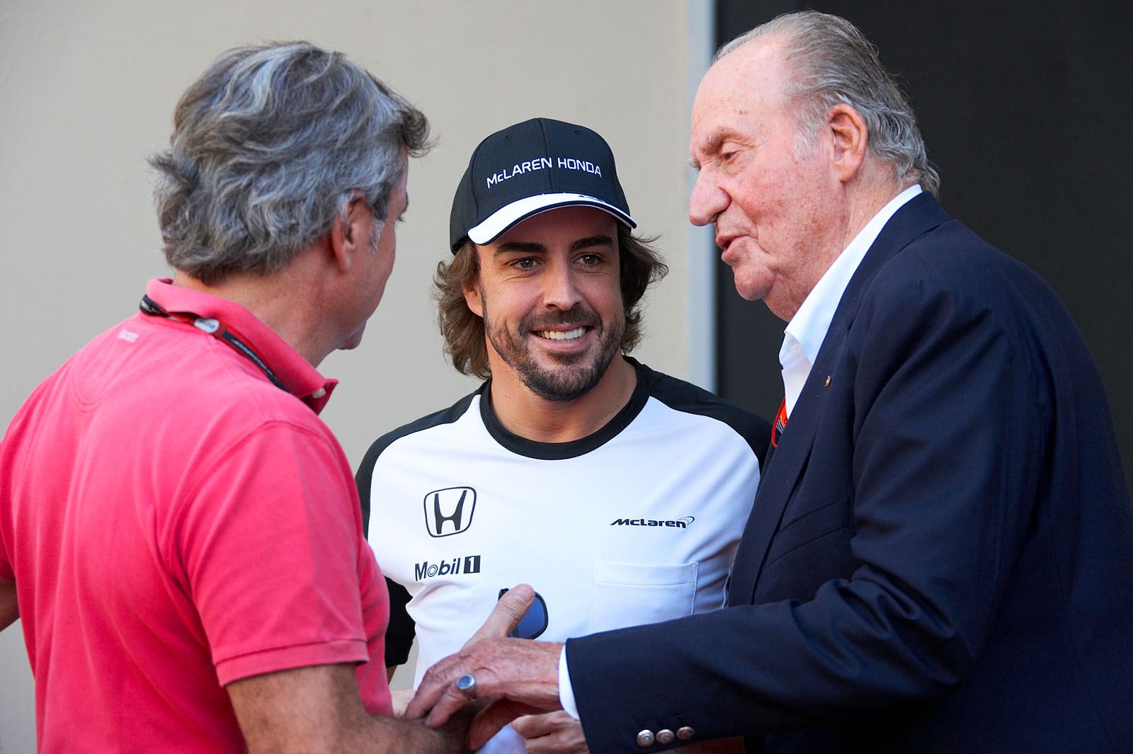 Spanish brotherhood: McLaren driver and double F1 World Champion Fernando Alonso, with rally driver Carlos Sainz (father of F1 driver Sainz Jr.), and Juan Carlos, King of Spain from 1975 to 2014