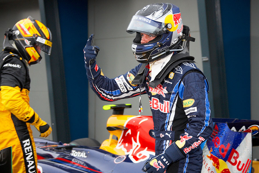 Polesetter Sebastian Vettel in parc ferme, behind him Kubica