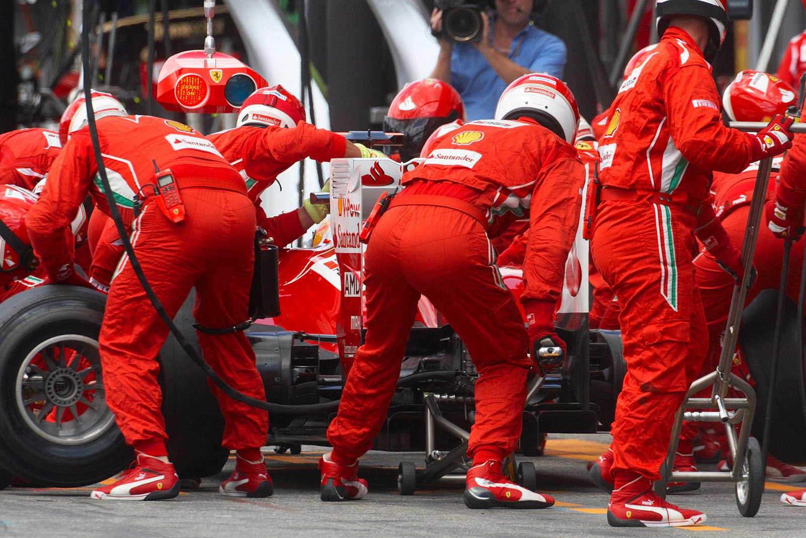 Fernando Alonso stops at Ferrari pits