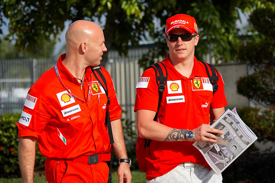 Winning Finn Kimi Raikkonen with physio Mark Arnall