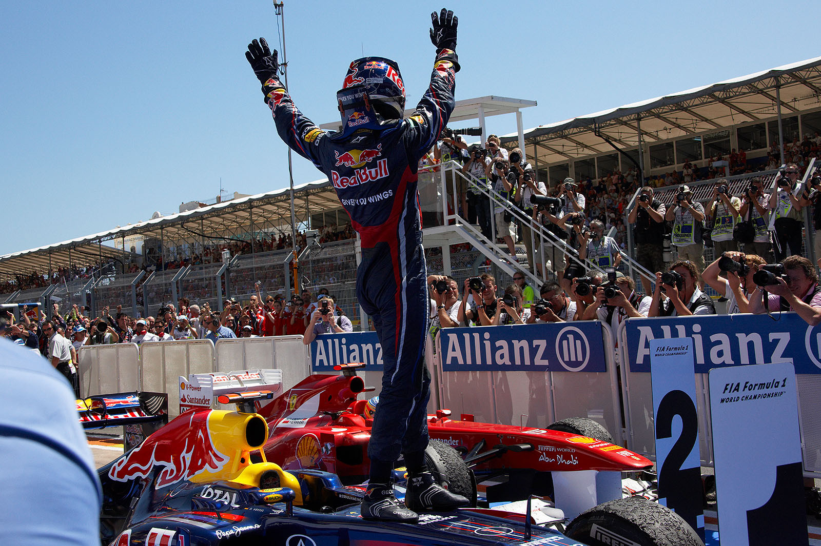 Race winner Sebastian Vettel celebrates in parc ferme