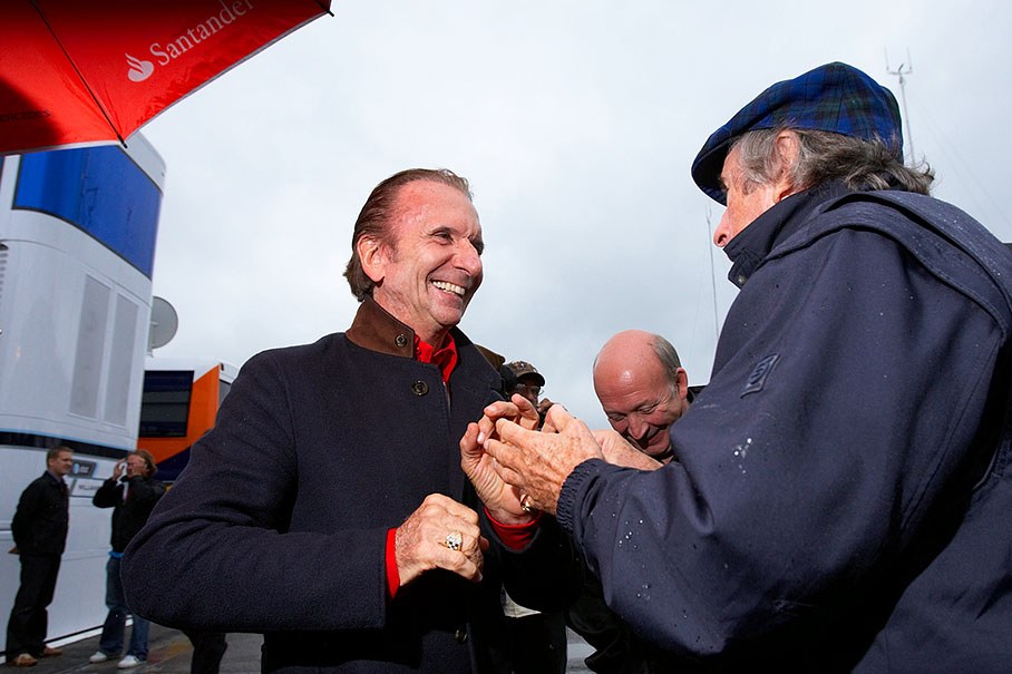 Emerson Fittipaldi is warmly welcomed by Sir Jackie