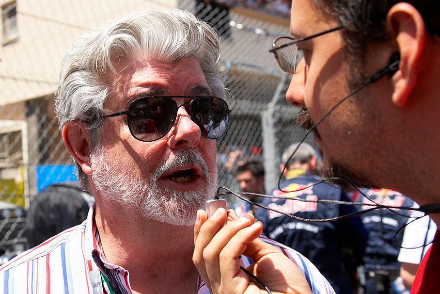 Regular Monaco Grand Prix visitor and legendary director George Lucas gives an interview on the grid
