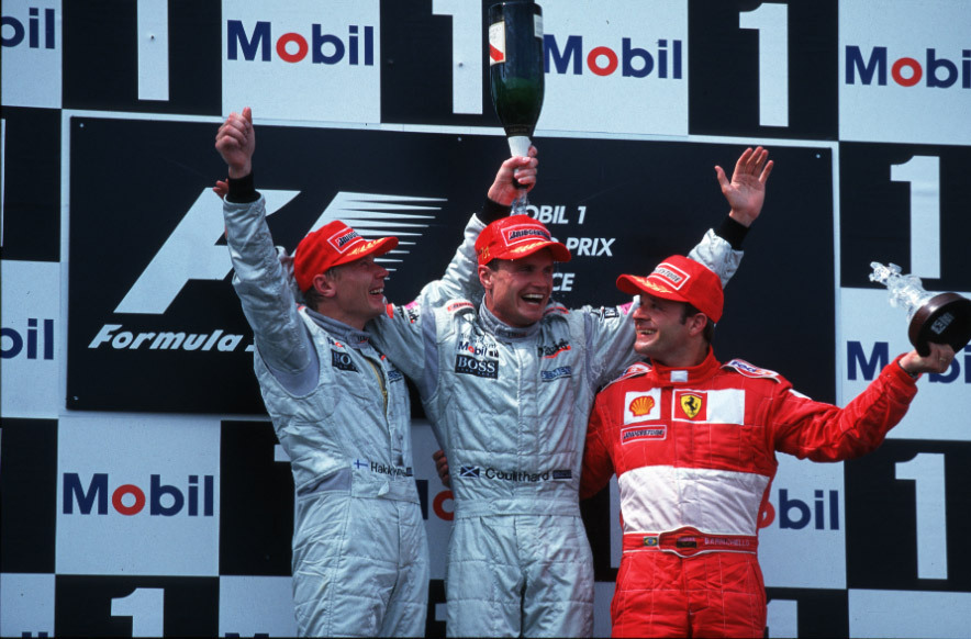 David Coulthard the winner of the French Grand Prix together with the second Mika Häkkinen and third Rubens Barrichello.