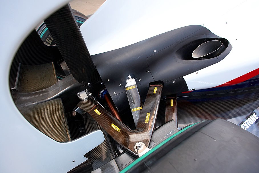 The suspension and exhaust end pipe of a BMW Sauber car