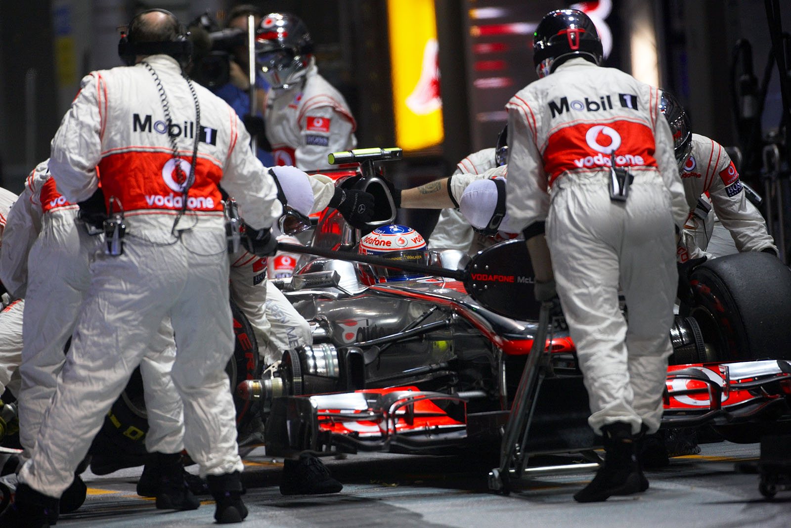 Jenson Button stops at McLaren pits