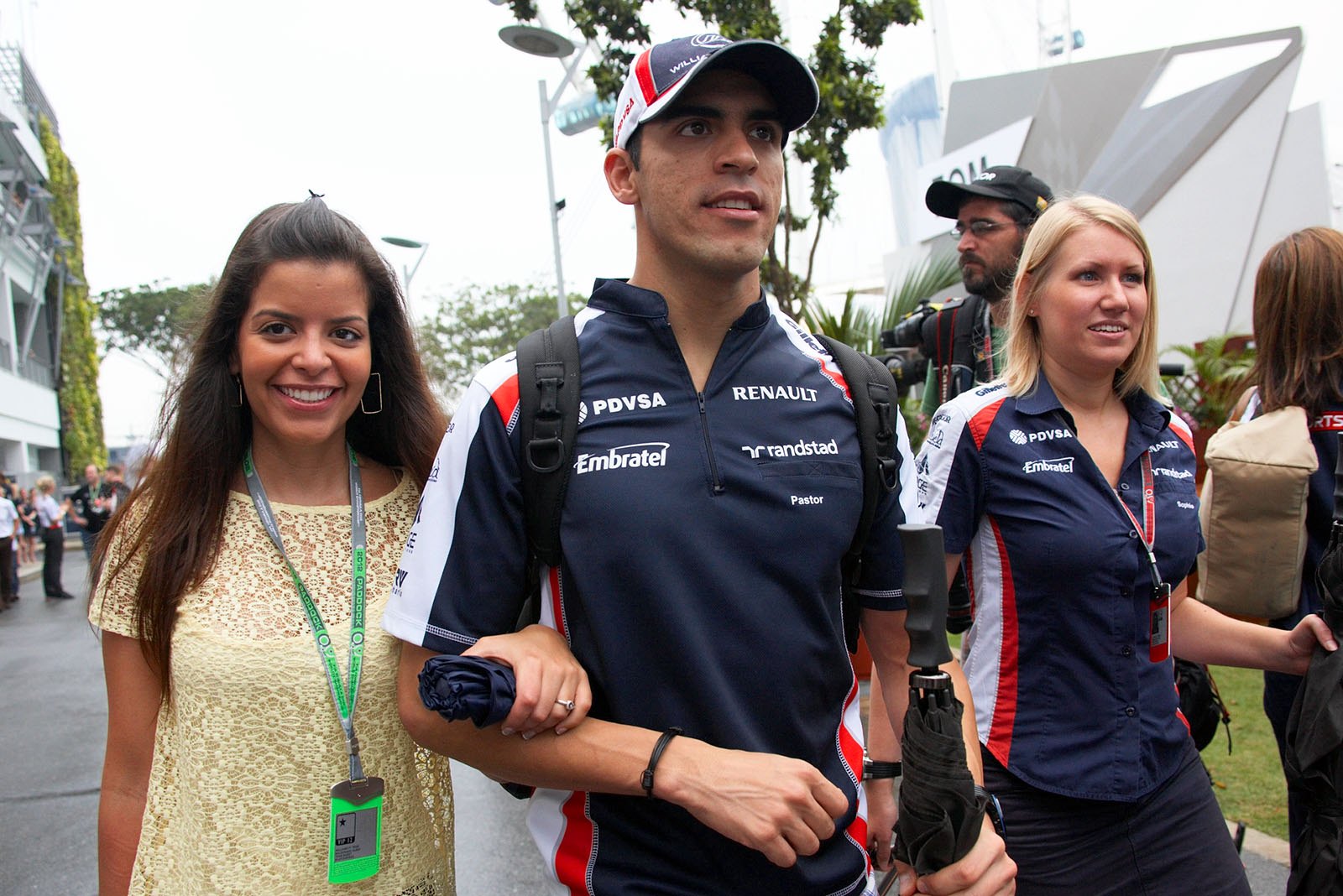 Pastor Maldonado of Williams arrives in the paddock with his girlfriend Gabriella Tarkany
