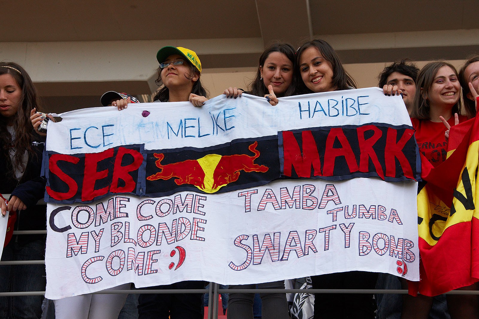 Fans of Sebastian Vettel and Mark Webber present a cryptyc message on their banner