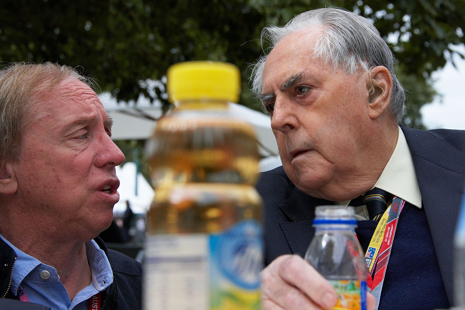 Entrepreneur and former F1 and sports cars driver Vern Schuppan chats with Triple World Champion Jack Brabham