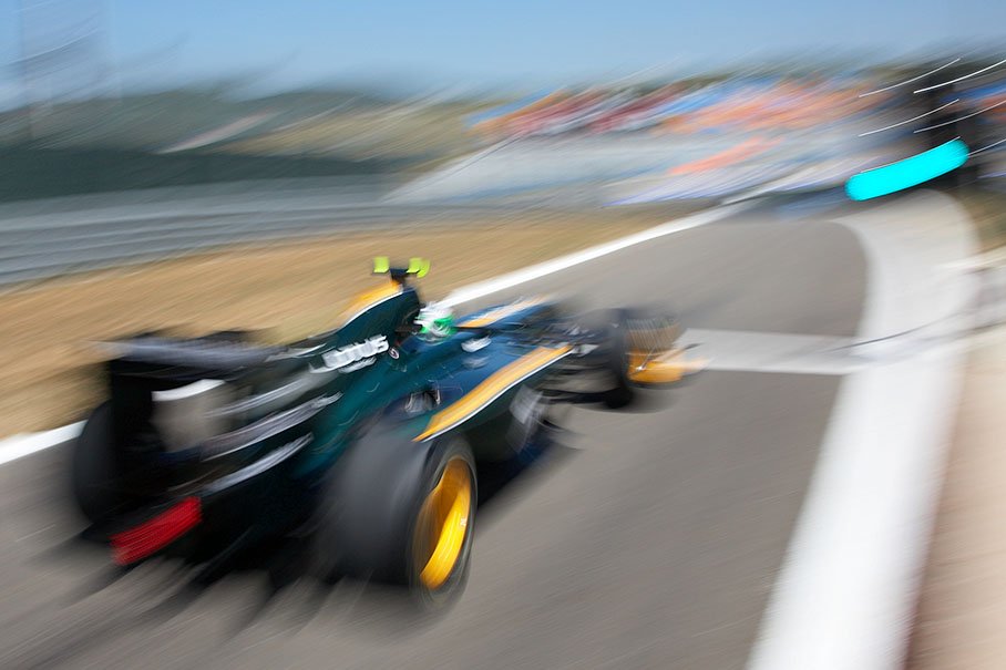 Heikki Kovalainen, Lotus Racing, at pit lane exit