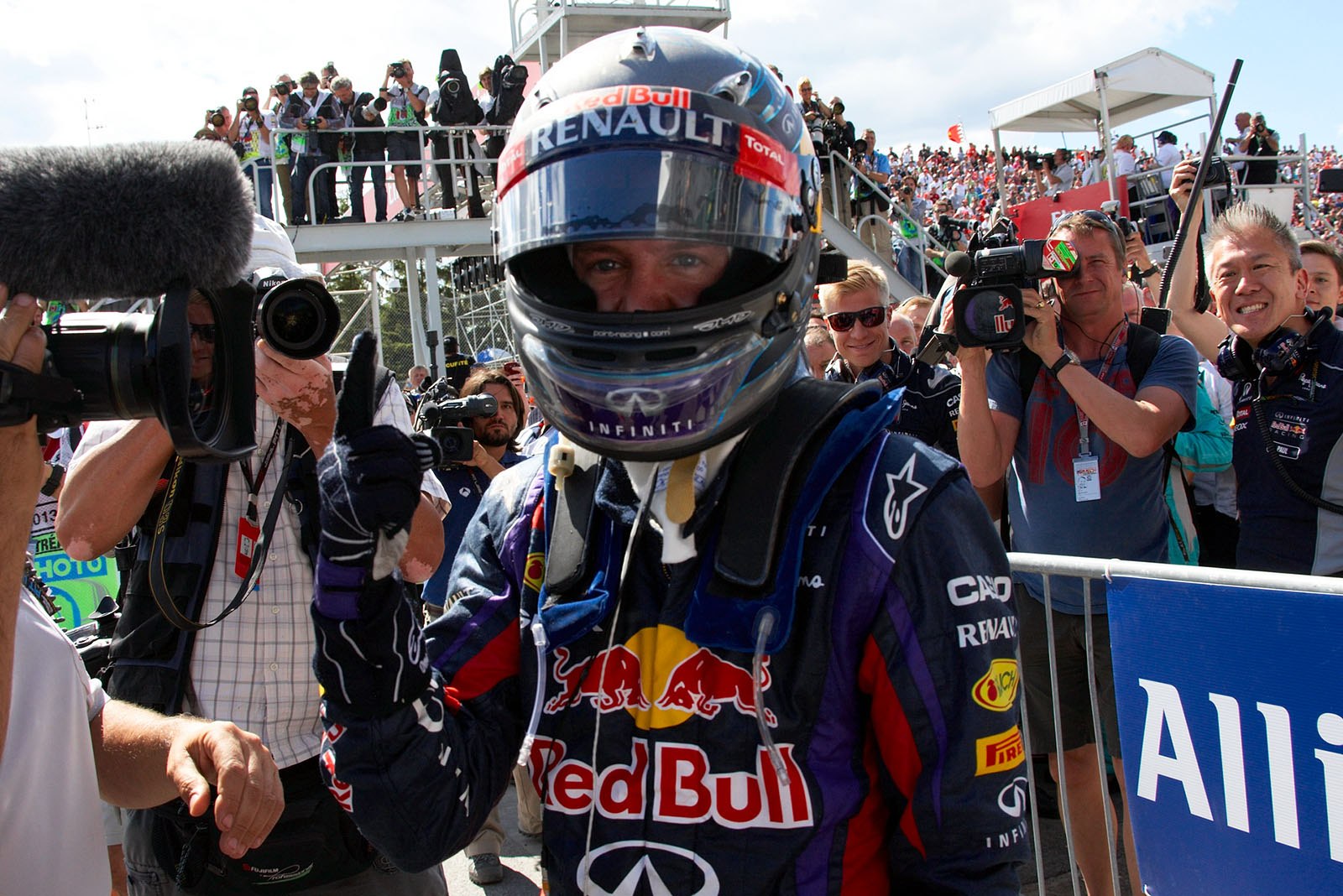 Race winner Sebastian Vettel of Red Bull Racing celebrates in parc ferme