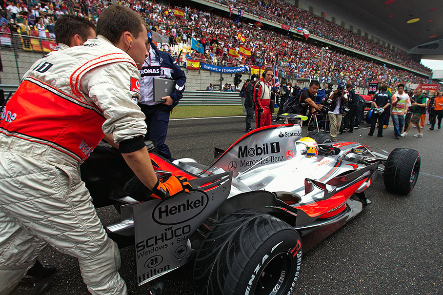Lewis Hamilton is being pushed to his grid place