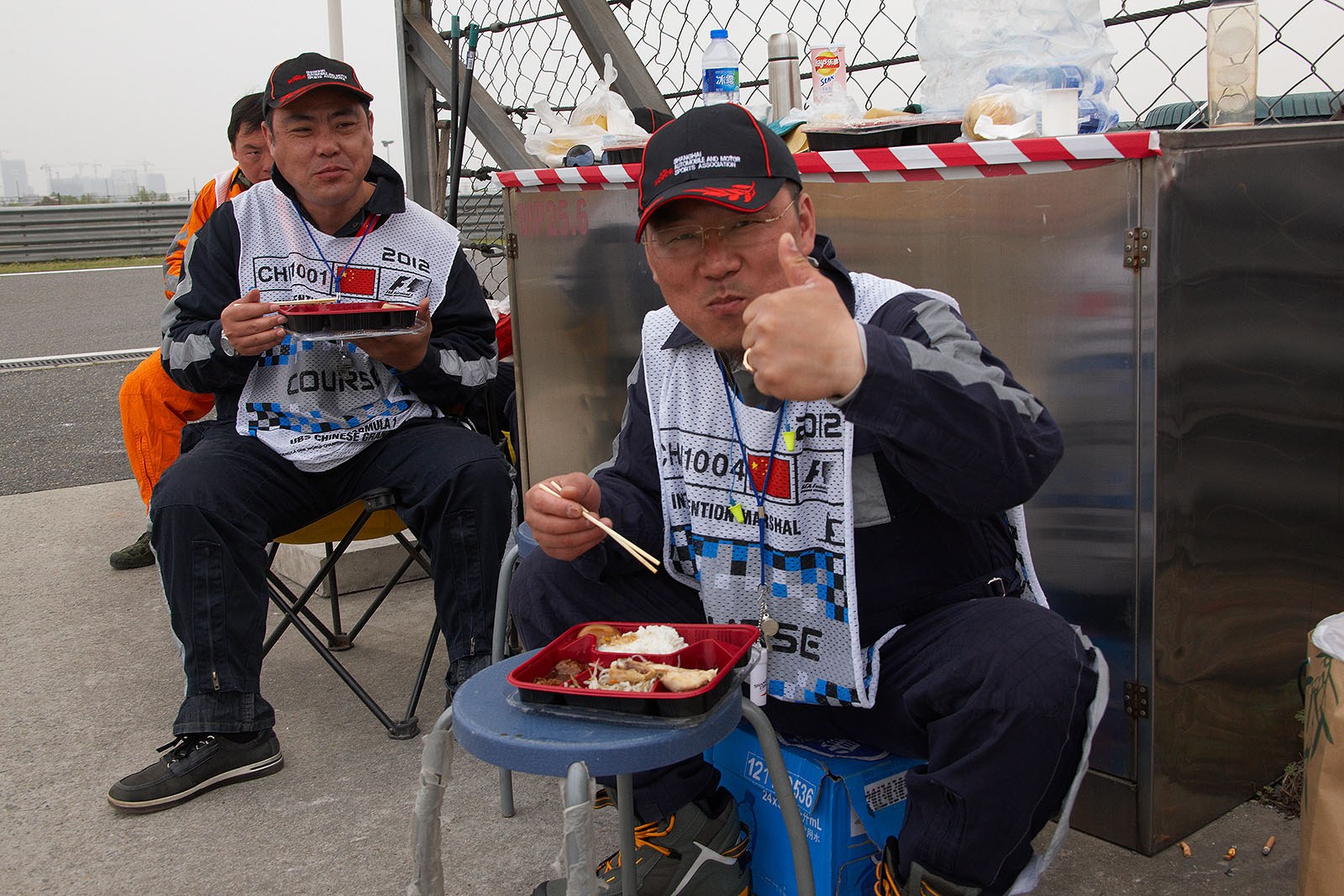 The marshals have a quick lunch before the GP starts