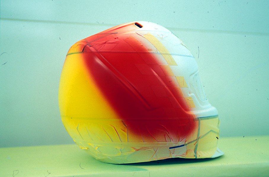 Peter Ginneken of BELL Helmets S.A. making the artwork of the 1998 Suzuka race helmet for Michael Schumacher