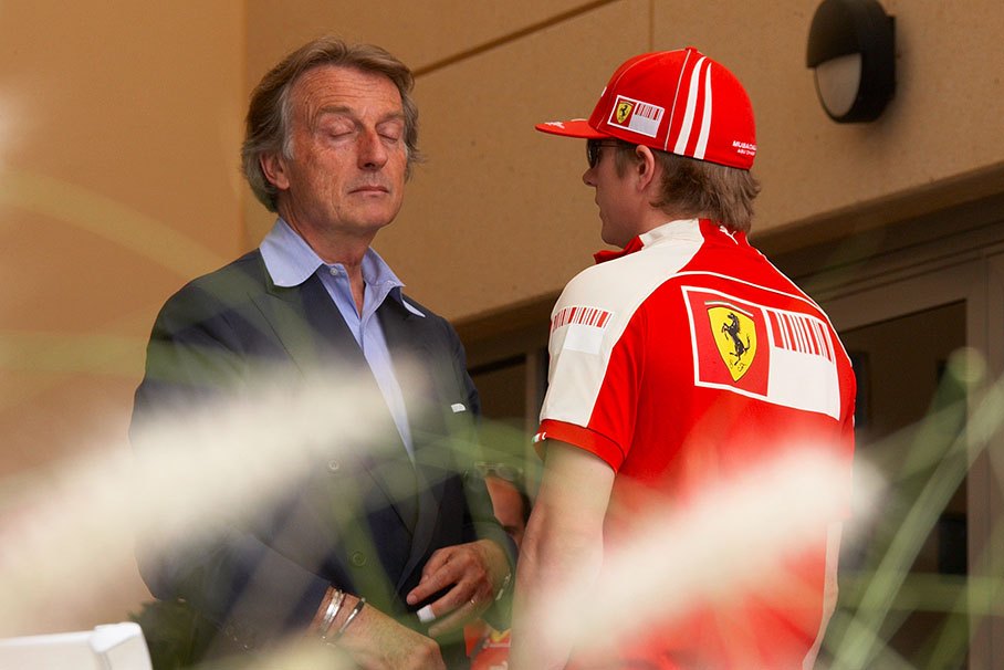 Ferrari's Luca di Montezemolo has a serious talk with his driver Raikkonen