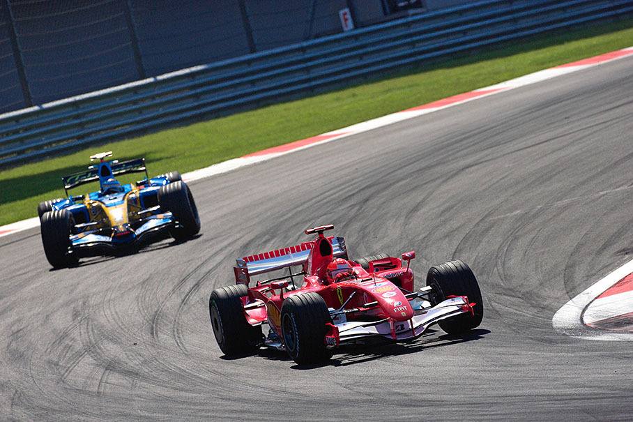 Michael Schumacher yet leading a drifting Alonso