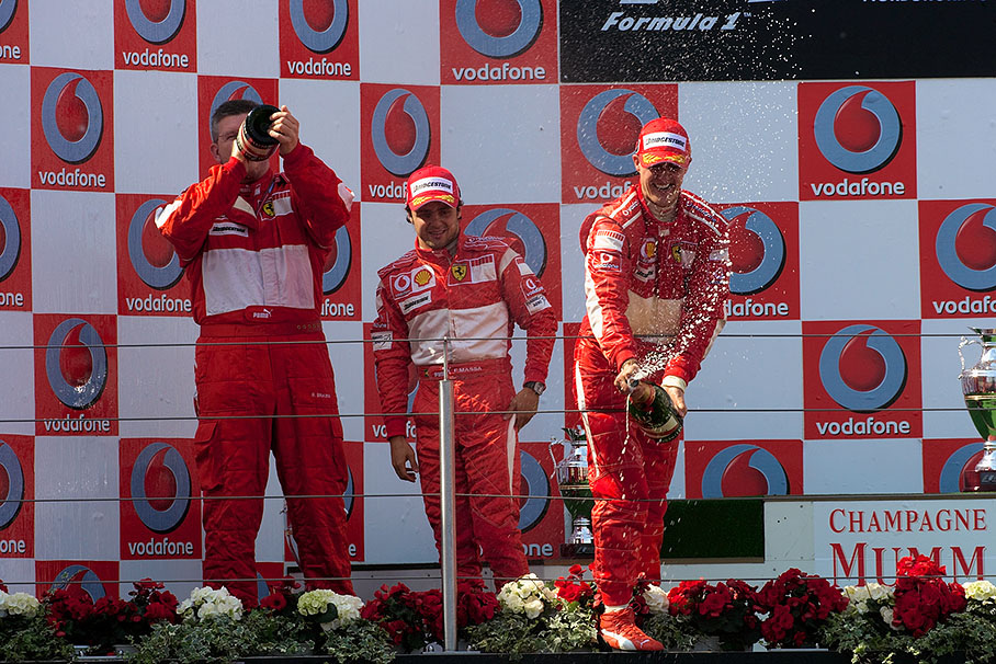Ross Brawn, Felipe Massa and Michael Schumacher on podium