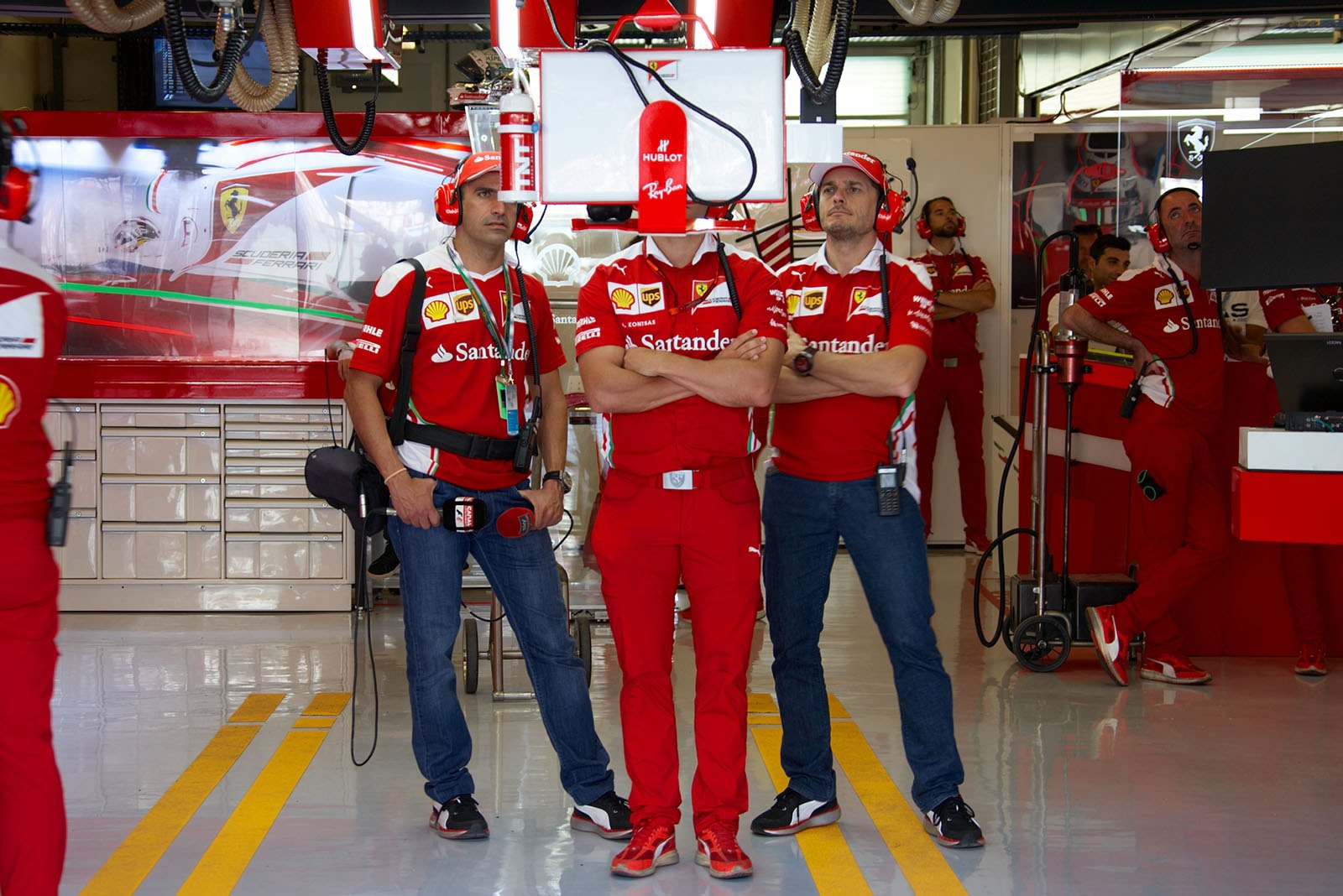 Marc Gene and Giancarlo Fisichella in the Ferrari pits, Abu Dhabi Grand Prix, 2016