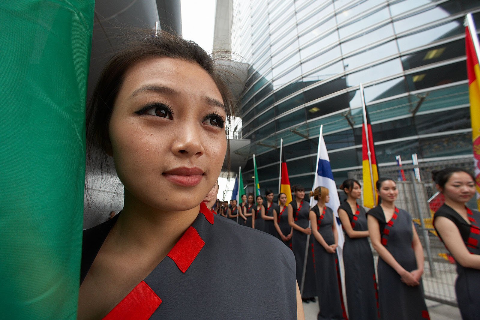 Grid girls line up for their deployment