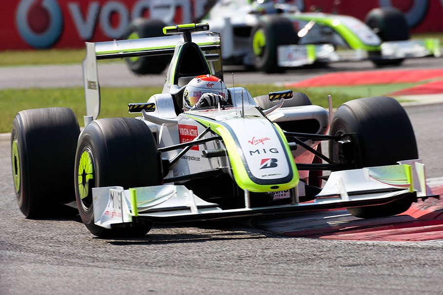 Brawn GP's Rubens Barrichello in front of his team mate Button