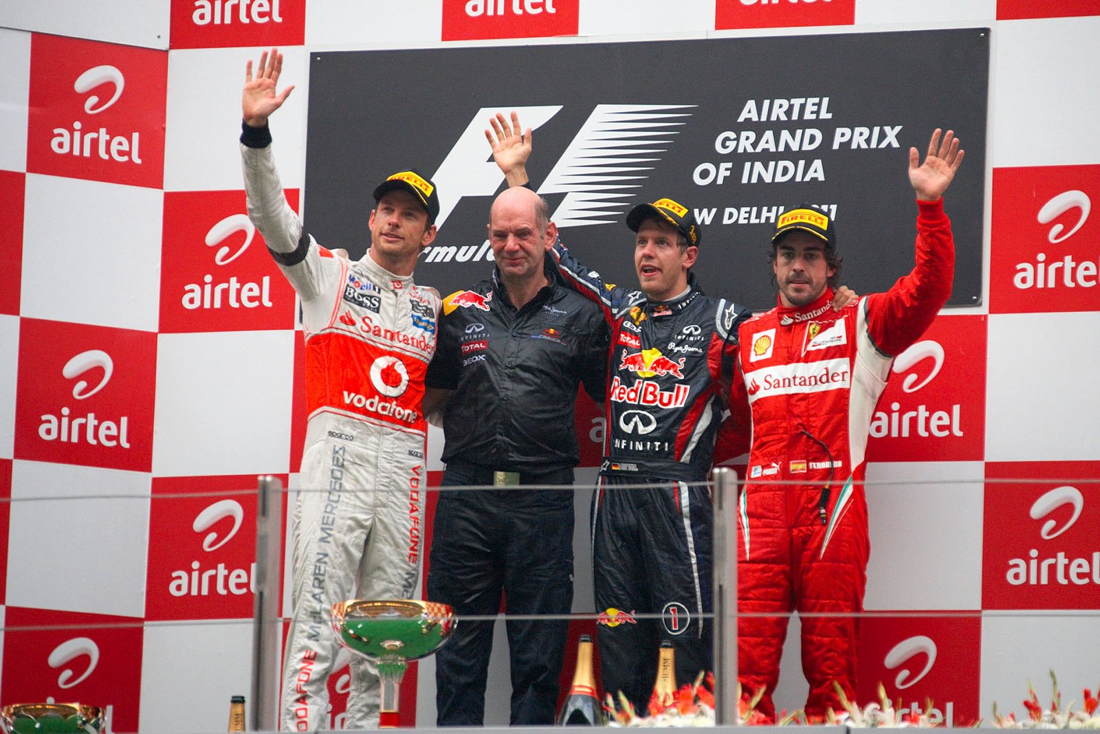 Final podium ceremony group photo with Red Bull Racing's technical chief Adrian Newey, second placed Jenson Button of McLaren, Red Bull's race winner Sebastian Vettel and as third Fernando Alonso of Ferrari