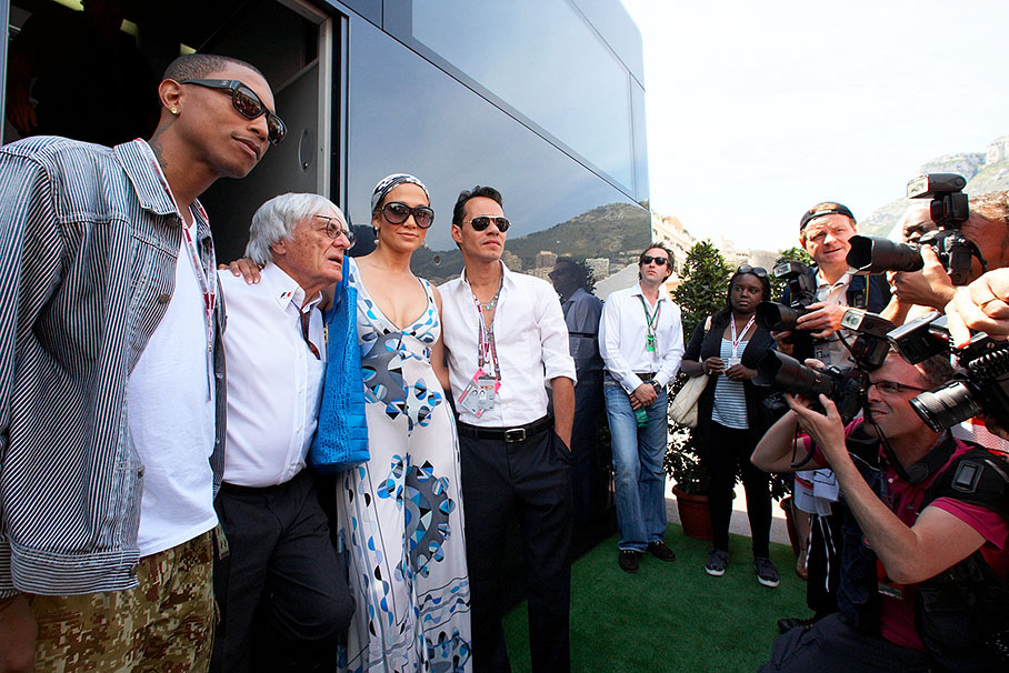 Bernie Ecclestone poses for the press with singer Pharrell Williams, actress Jennifer Lopez and her husband Marc Anthony