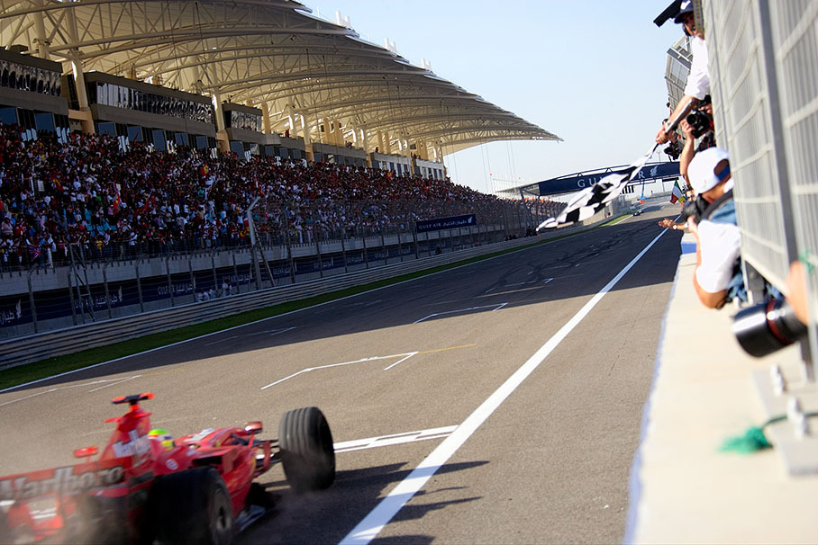 Felipe Massa takes the chequered flag