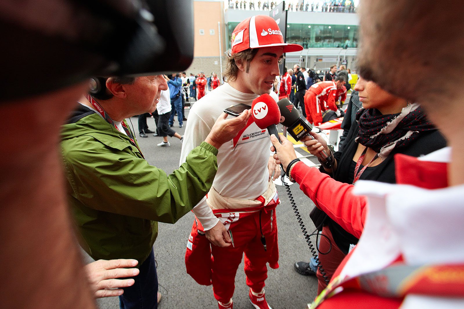 Fernando Alonso, Ferrari, gives interviews before the race