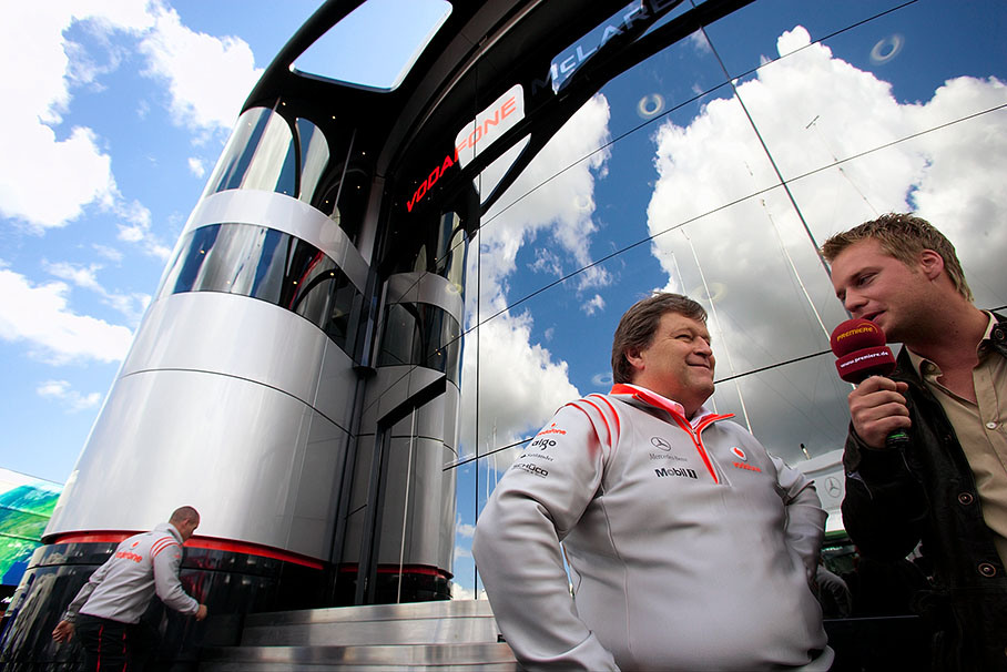 Mercedes motorsport director Norbert Haug is being interviewed in front of his new viewproof office