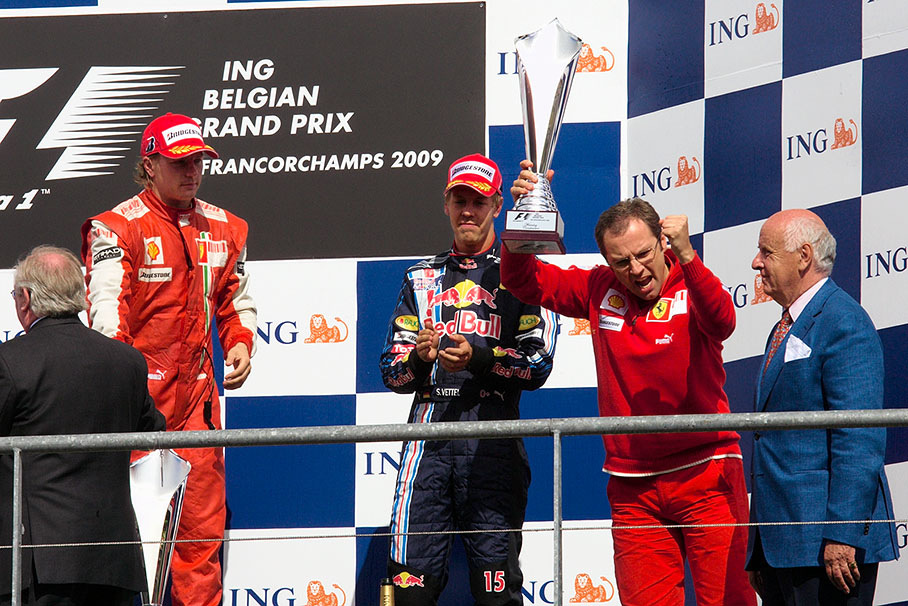 Ferrari team principal Stefano Domenicali proudly presents the Winning Constructor's trophy