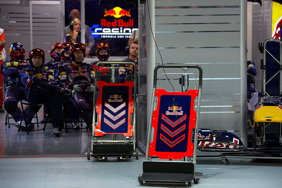Jacks wait for their use in front of the Red Bull pits