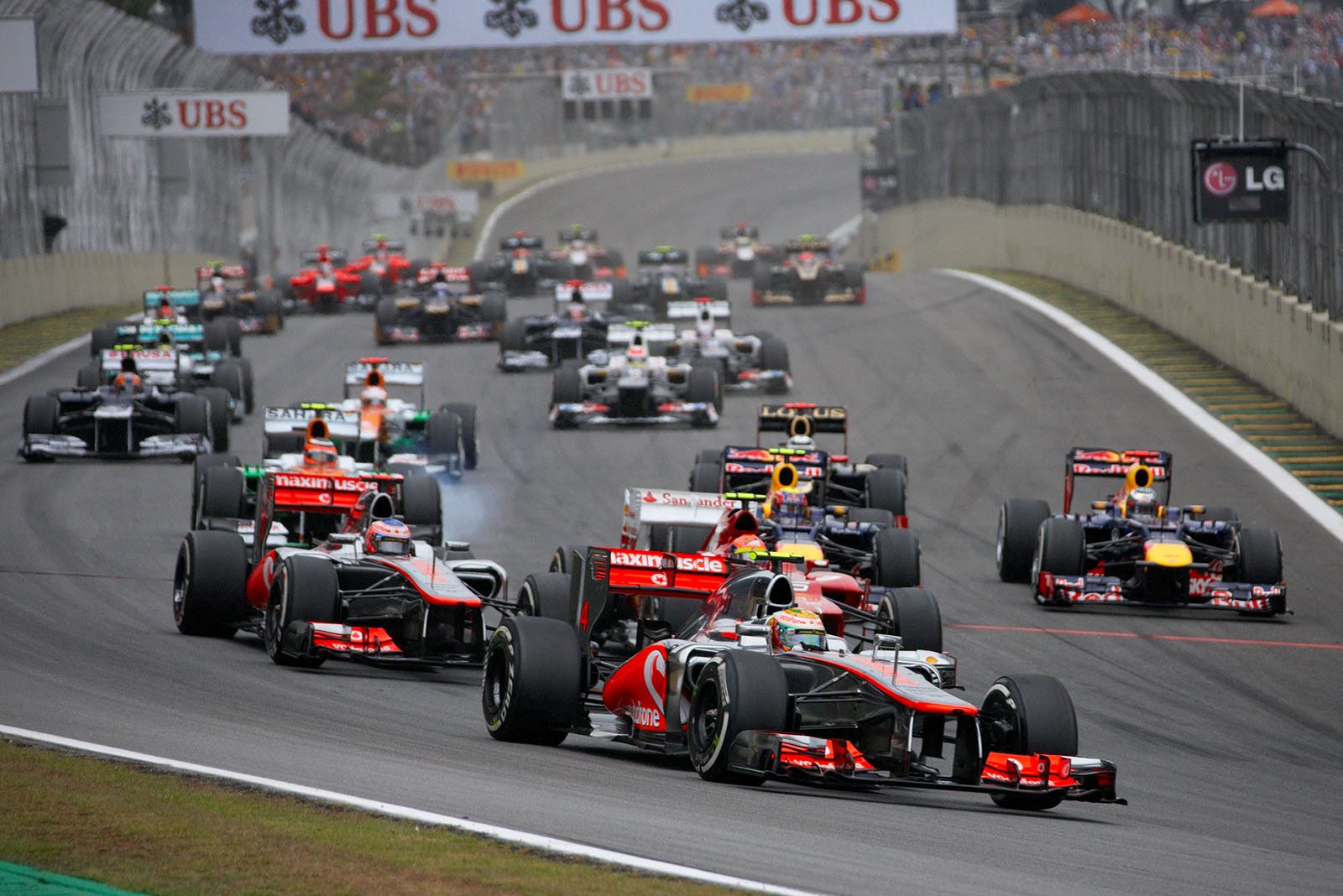 The start of the Brazilian Grand Prix, McLaren's polesitter Lewis Hamilton in front of his team mate Button