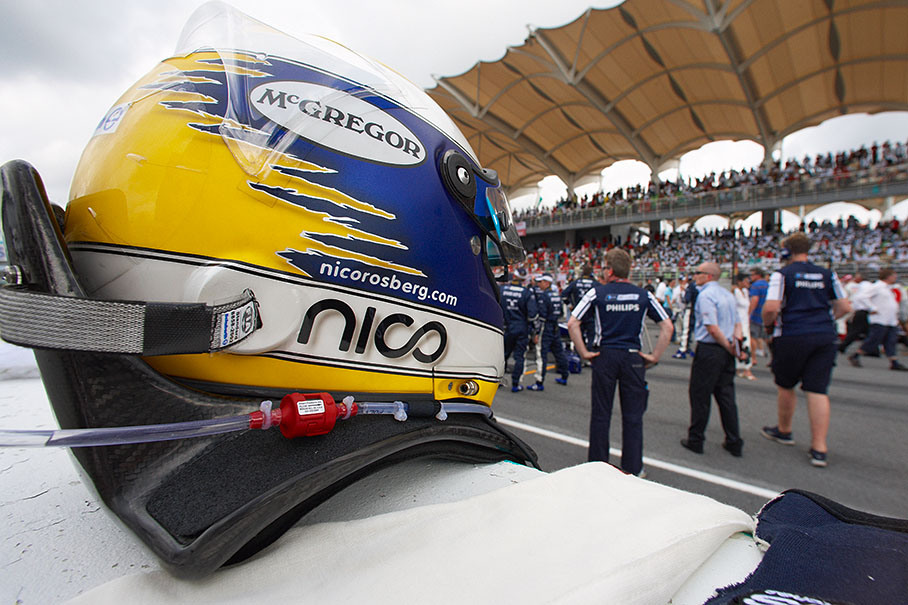 Nico Rosberg's helmet faces the grid