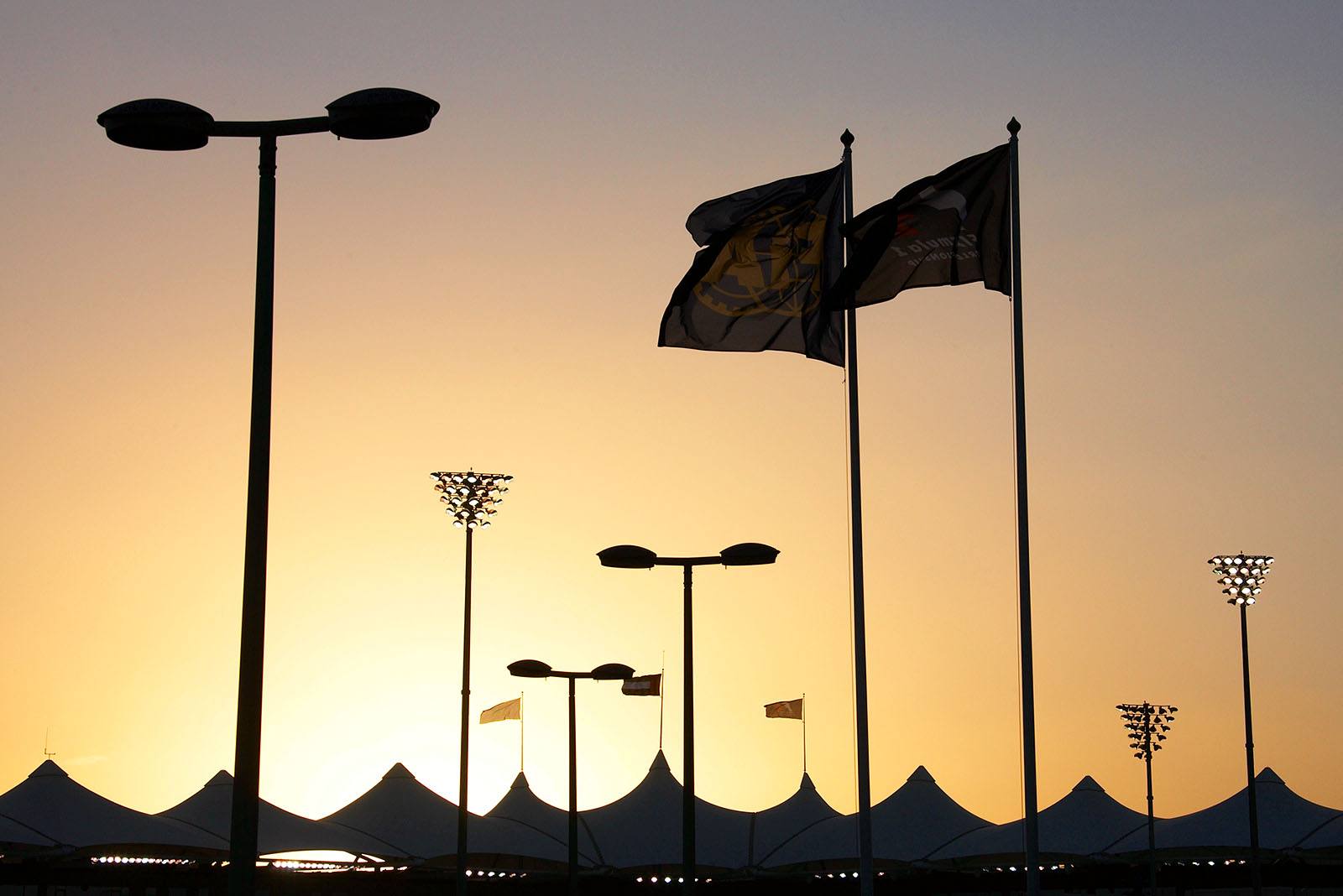 Sun sets behind Abu Dhabi paddock