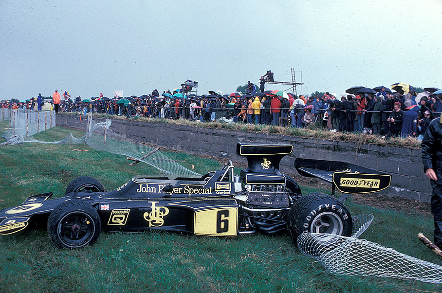 Jim Crawford's Lotus-Cosworth 72E spins off in the difficult changing weather conditions