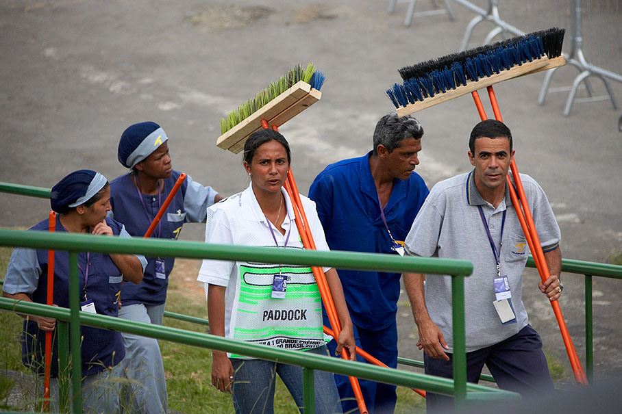 Busy workers assure a clean paddock