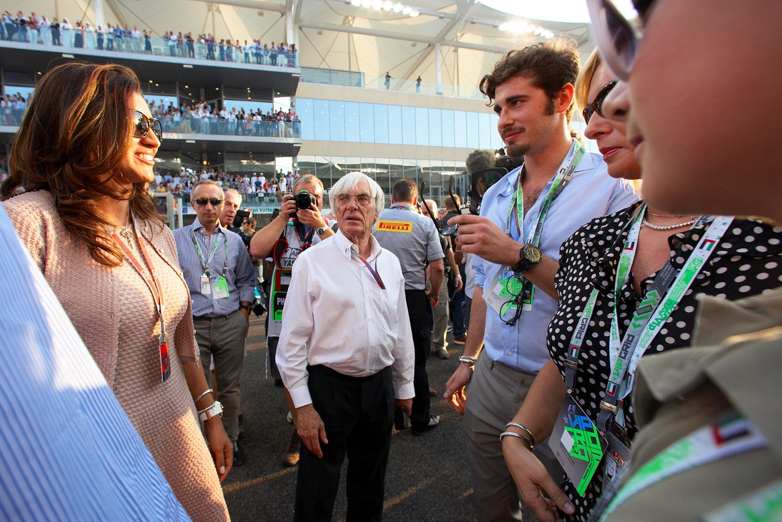 Bernie and Fabiana Ecclestone chat with VIPs on the grid