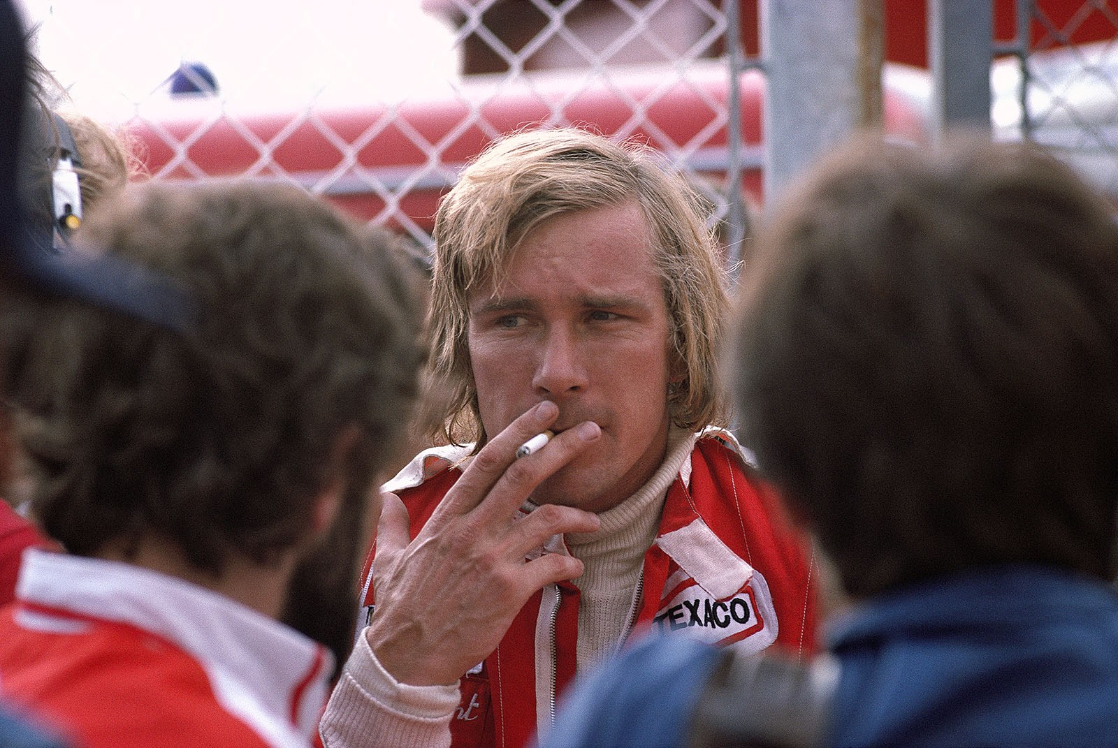 James Hunt takes a quick cigarette after qualifying for pole position, Austrian GP, 1976