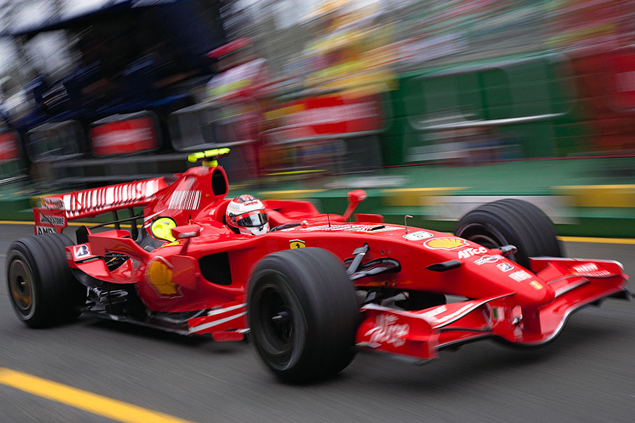 Kimi Raikkonen plays with his new red toy