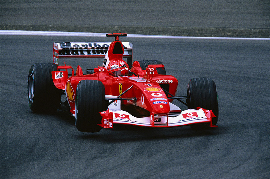 Michael Schumacher lifting a wheel at Nuerburgring's first corner