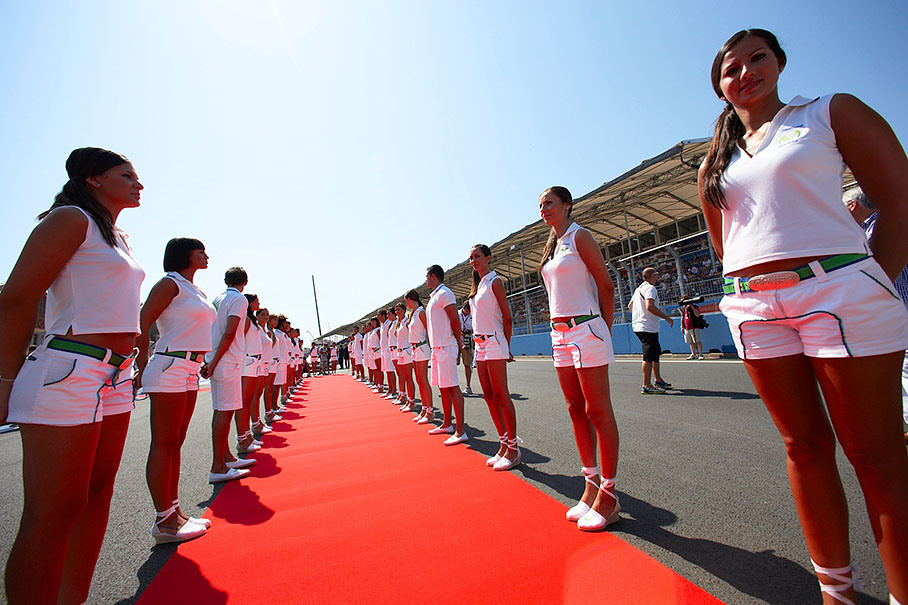 The grid girls (and grid boys!) wait in line before the drivers parade