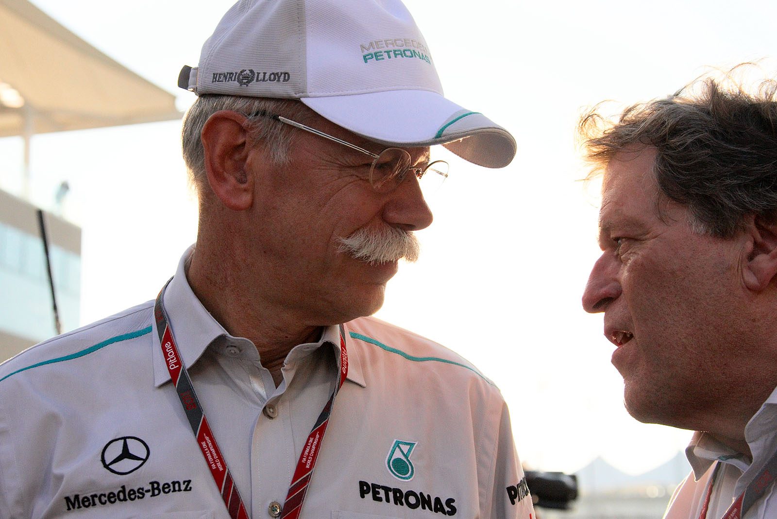 Daimler chairman of the board Dieter Zetsche chats with Mercedes Motorsport director Norbert Haug