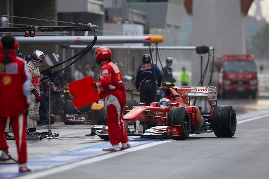 Still second positioned Fernando Alonso arrives at Ferrari pits