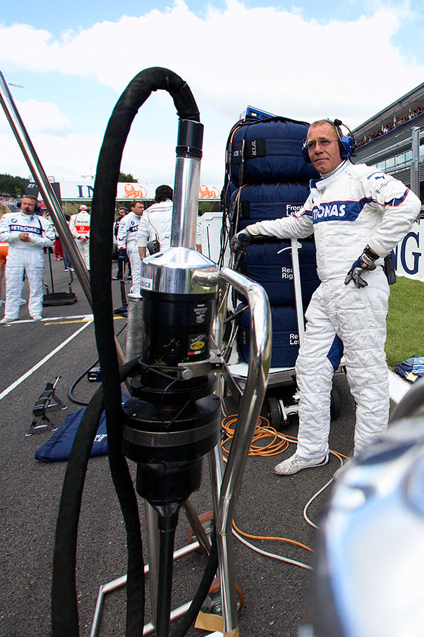 BMW Sauber's tyre manager guards the black gold on the grid